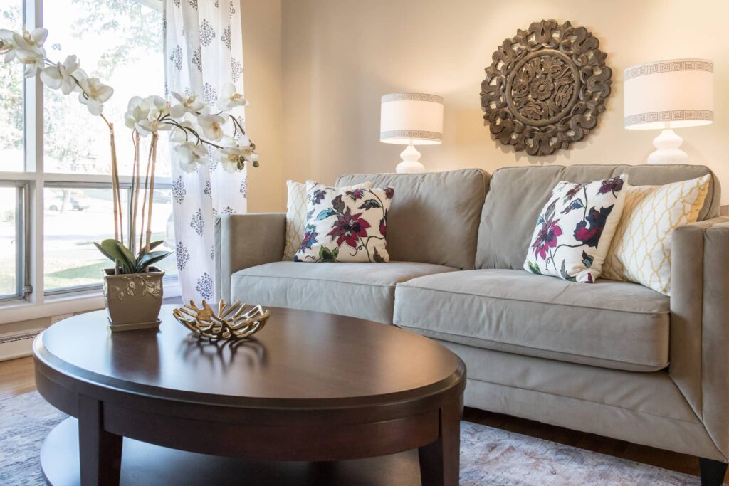 Couch focal point in staged living room, better staging pics