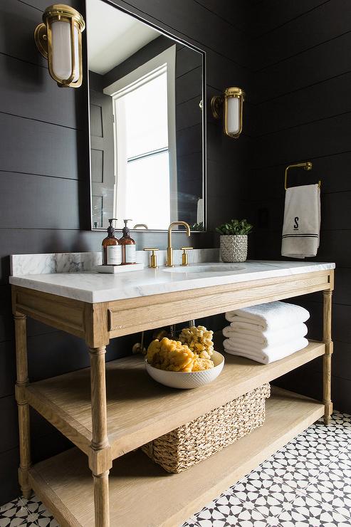 Black Shiplap Powder Room Walls with Weathered Oak Tiered Washstand and Cement Tile Floors
