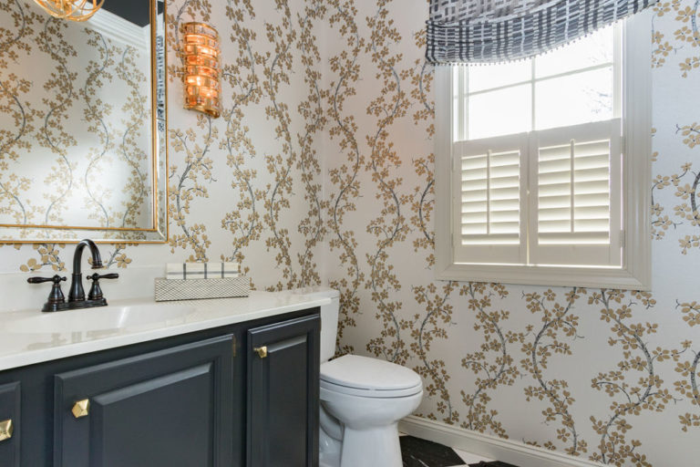 home staged bathroom with toilet seat down