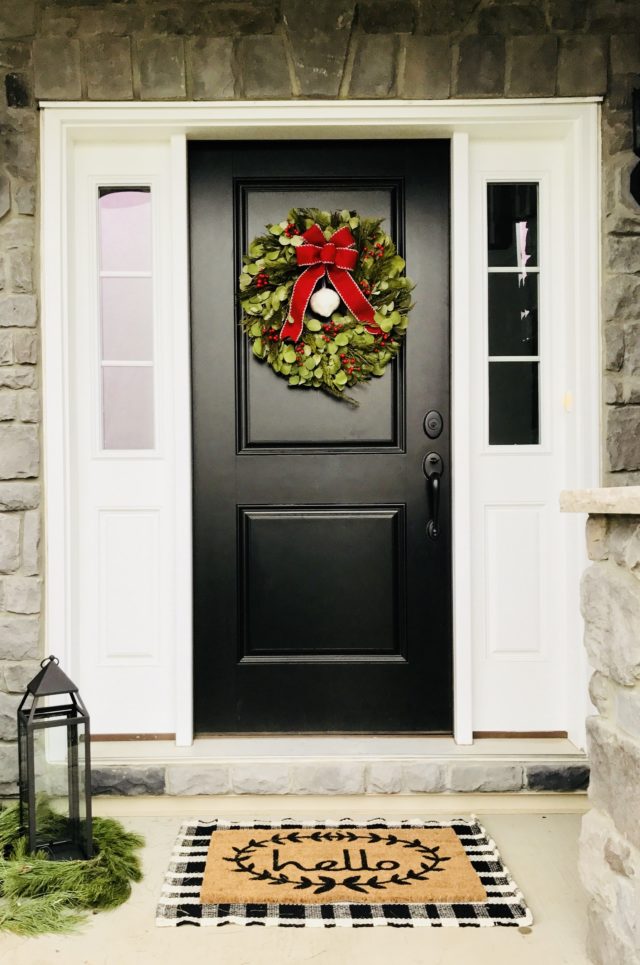 Holiday wreath on door, should you stage a house with holiday decor