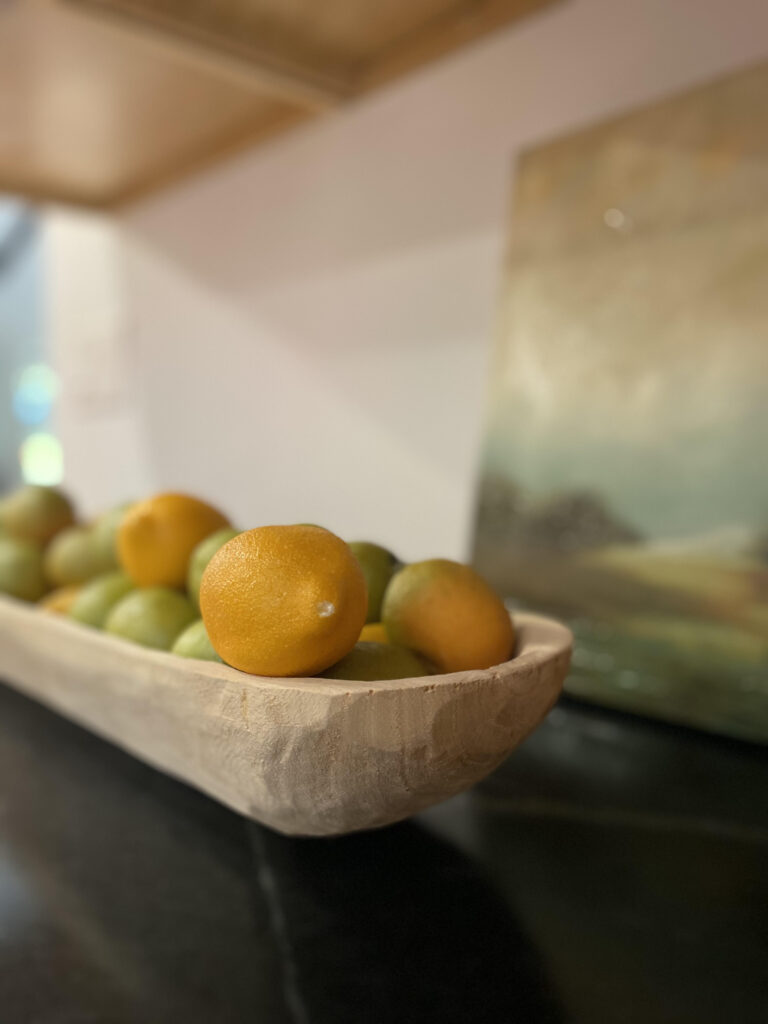 Small art + wooden trough = instant beauty, fruit in bowl