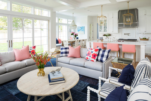 Photo by Martha O'Hara Interiors – tan couches with navy and peach throw pillows