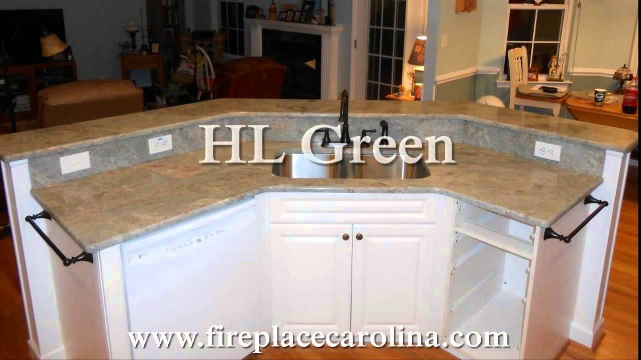 green counter with white cabinets