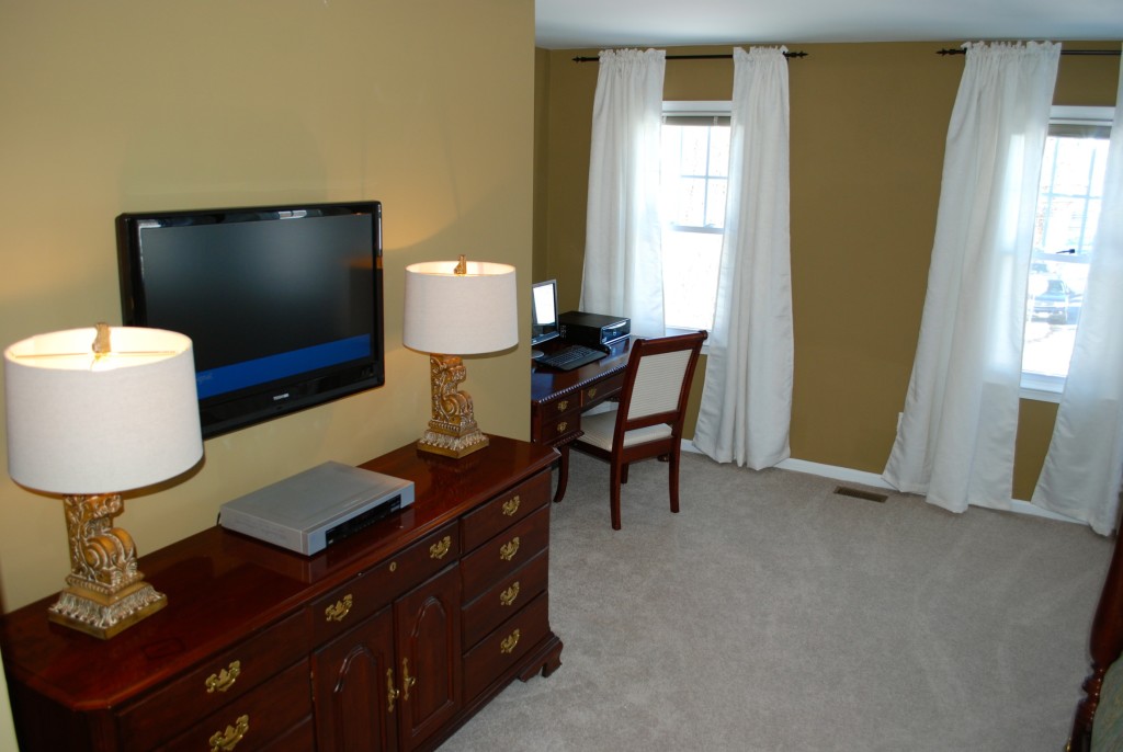 ebbott-master-bedroom-view-of-dresser, tv stands, bedroom staging