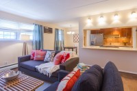 staging a condominium, family room after staging, family room way better