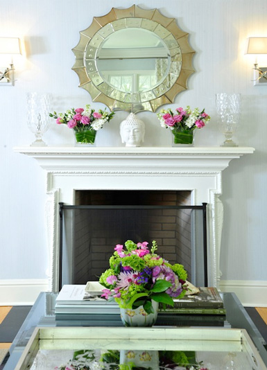How to stage a mantle, large mirror and flowers over mantle