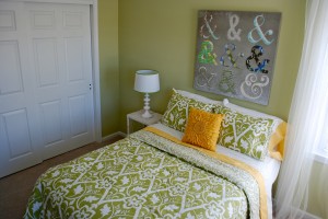 gallery walls, Overscaled art in bedroom above bed